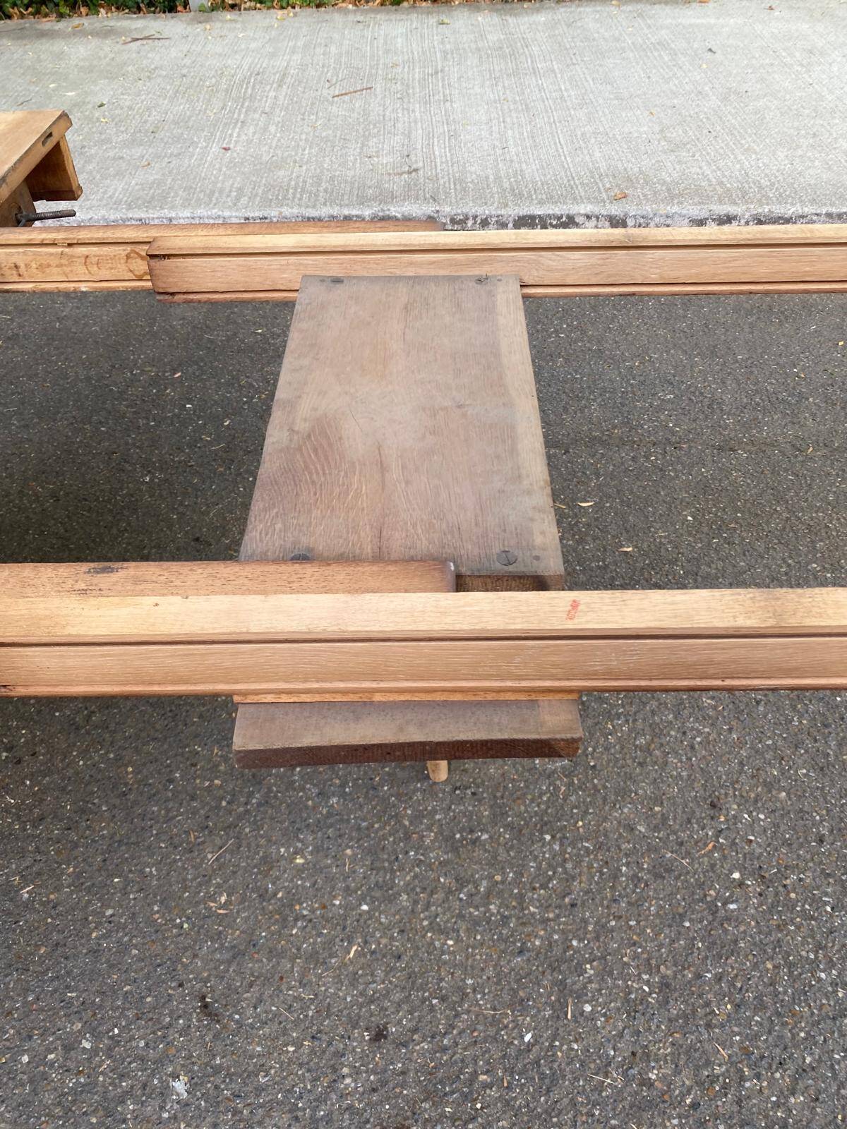 Art Deco round extendable dining table stripped in solid walnut from the 1920s.