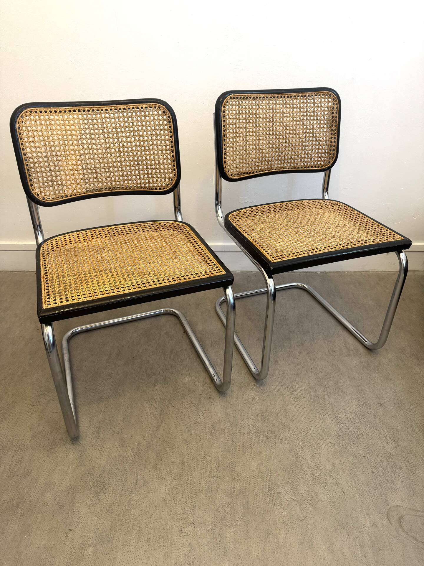 Pair of Marcel Breuer B32 Cesca chairs made in Italy.