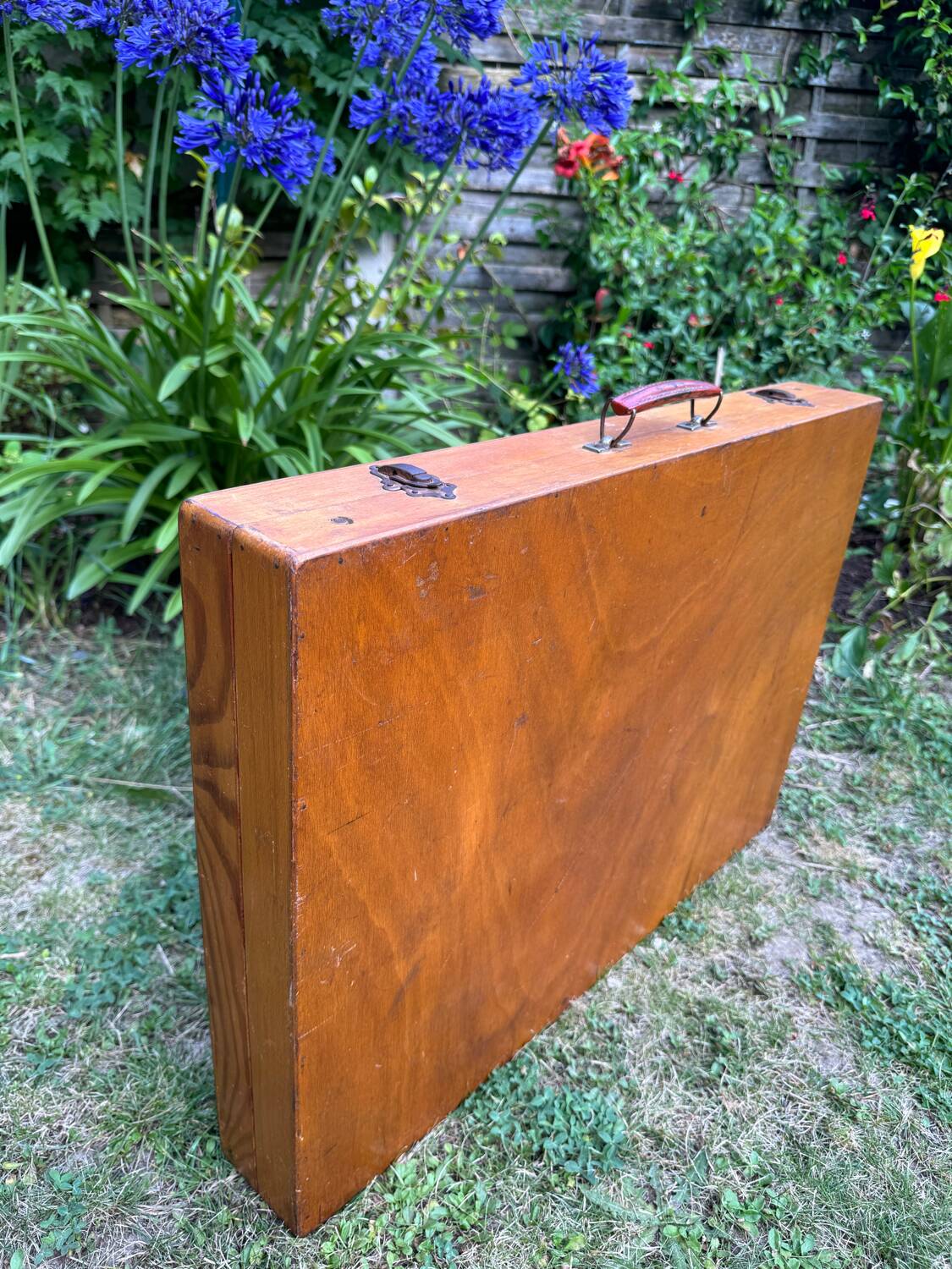 Old suitcase, table and stools, vintage wooden picnic