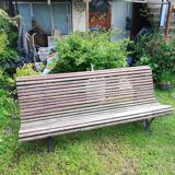 Old wooden bench and wrought iron