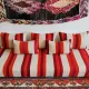 Set of covers for cream and red Moroccan floor sofa.
