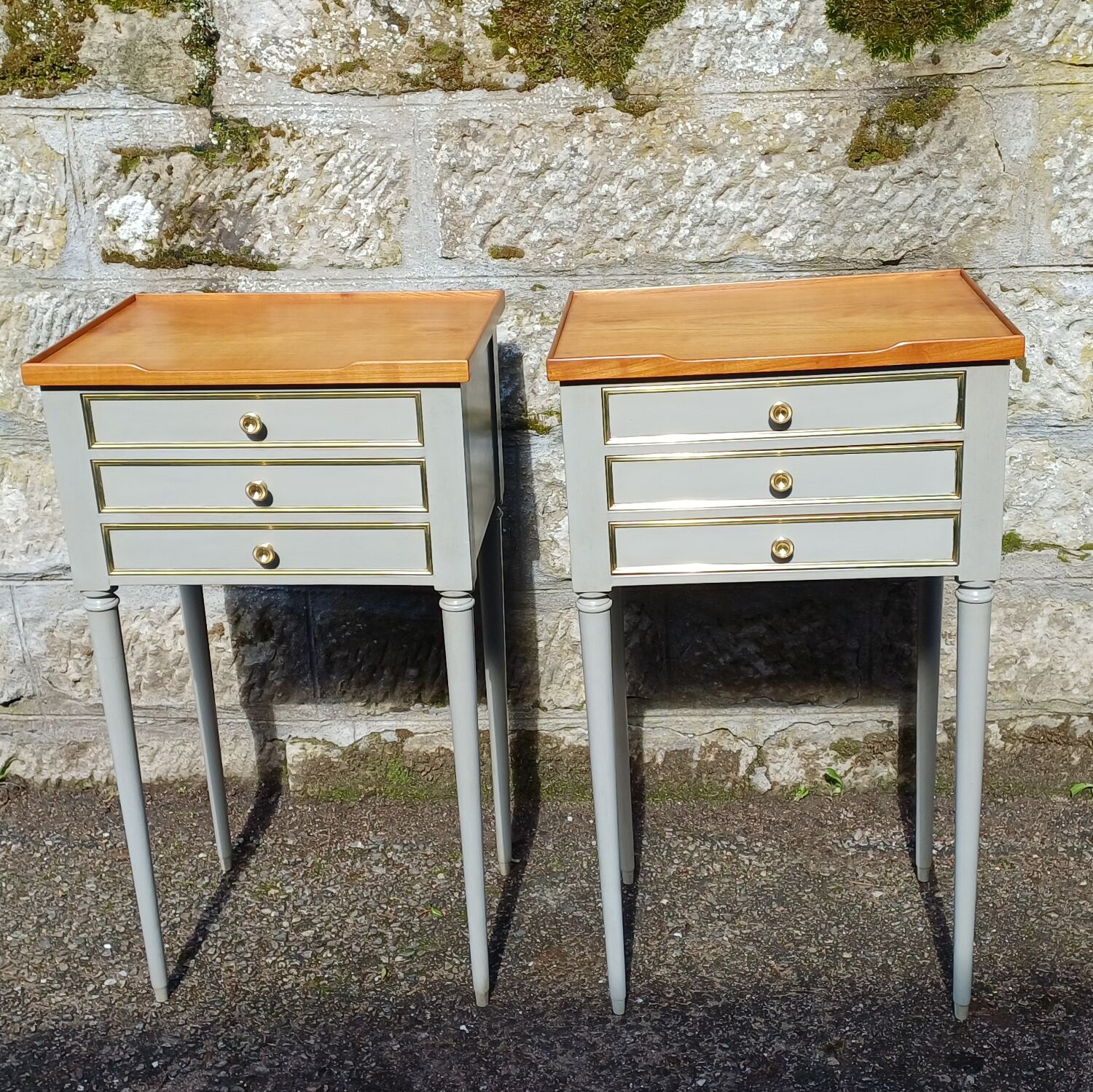 Pair of patinated bedside tables in Louis XVI style