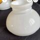 Vintage brass pendant light with opaline porcelain from the 1950s.