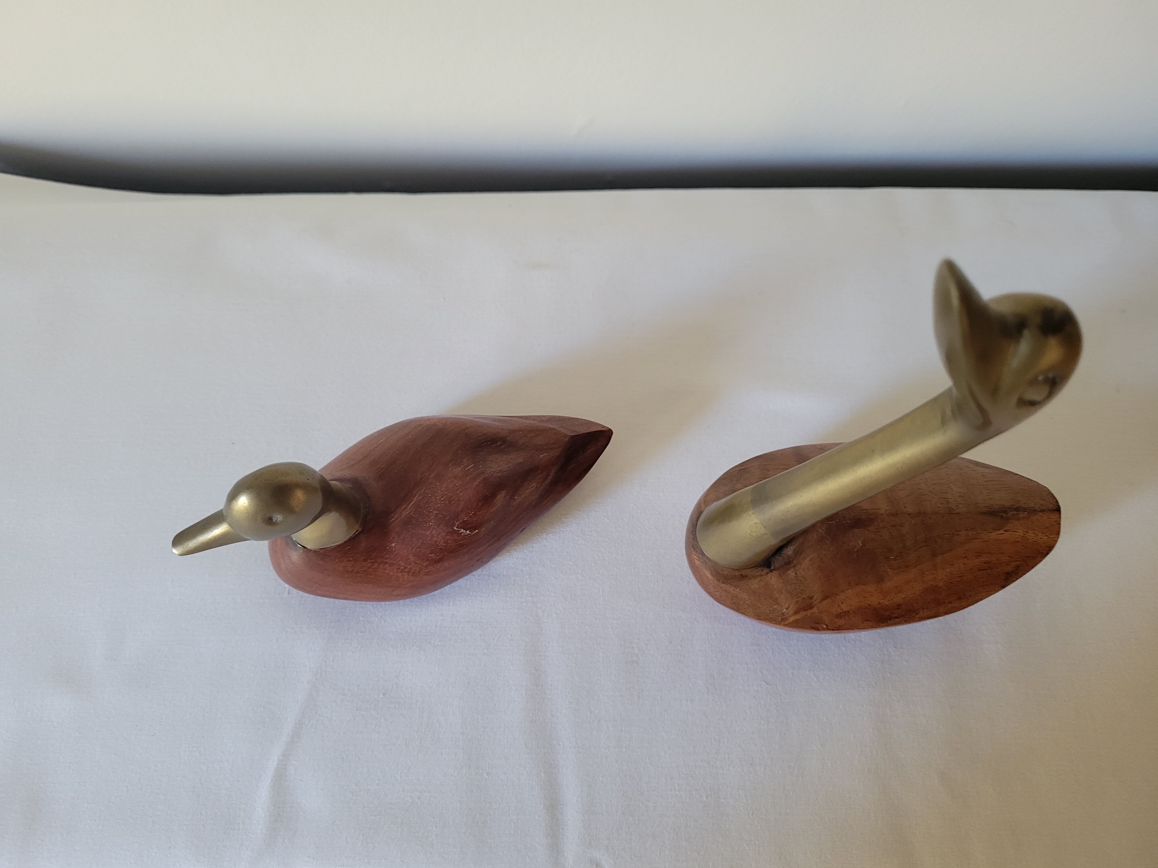 Duck and swan in brass and wood