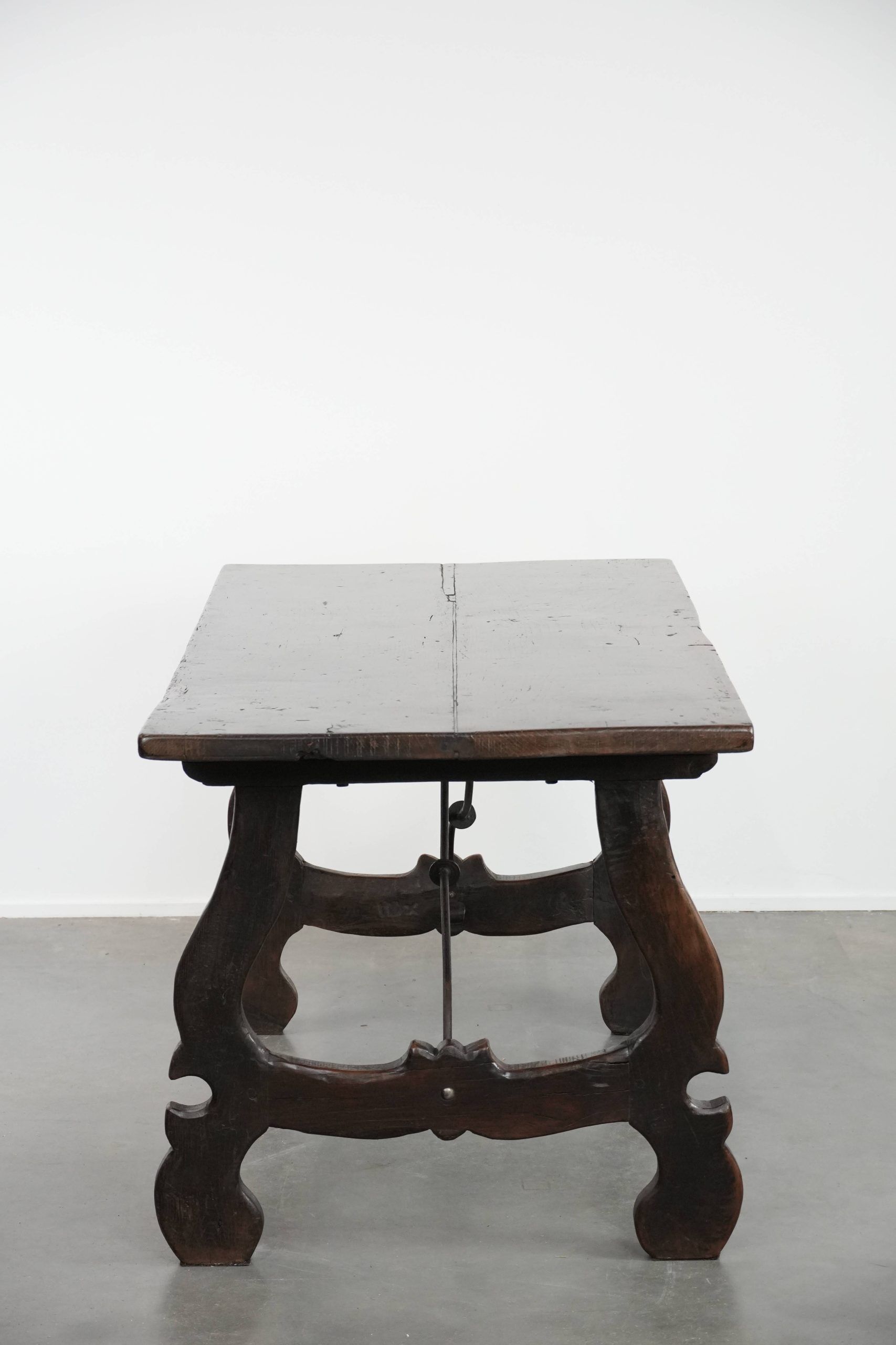 Antique Spanish table from the early 18th century with  a cast iron base