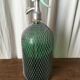 Large siphon origin Romania in glass with mesh body.