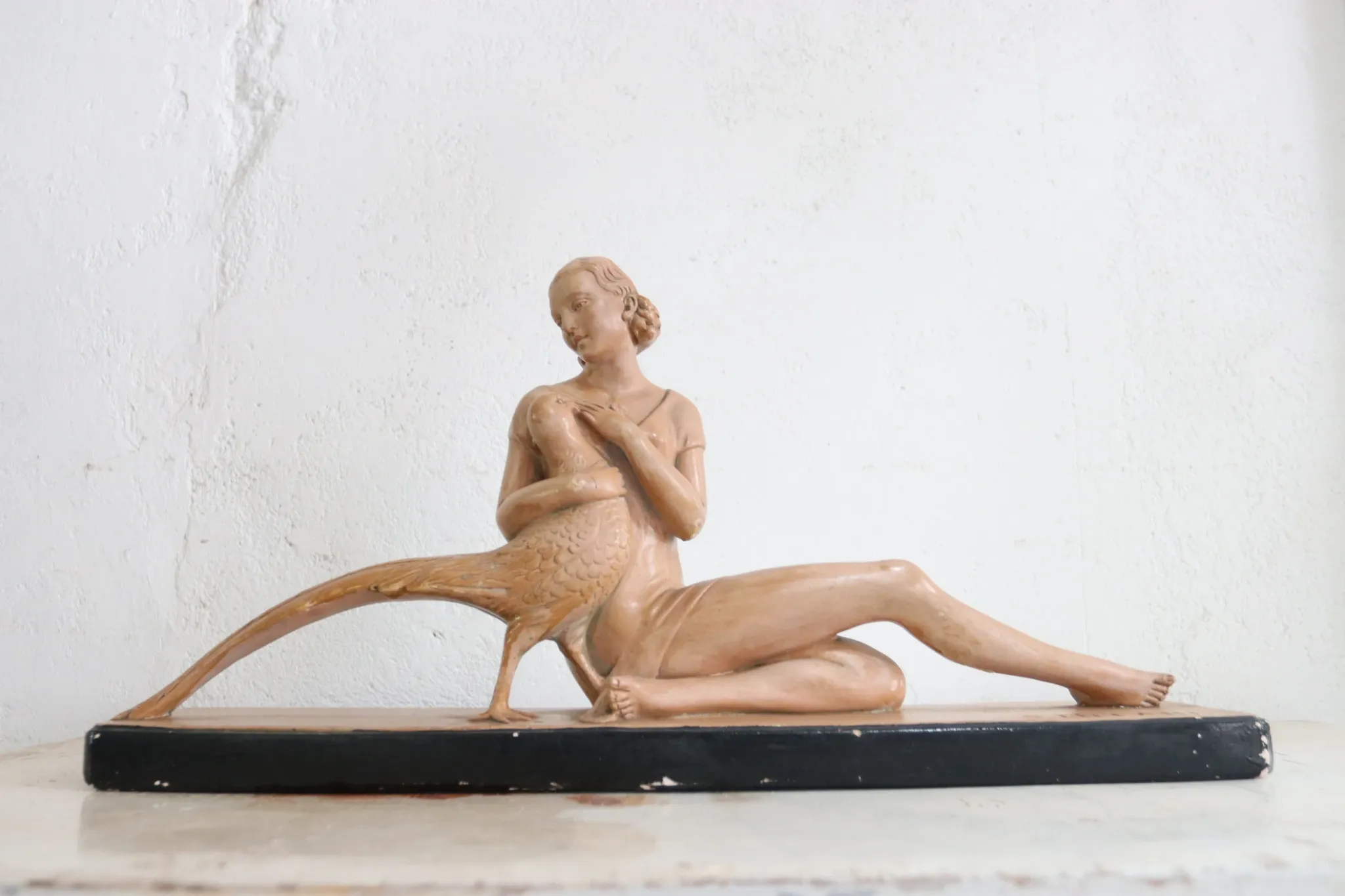 Salvatore Melani – Art Deco woman with pheasant, painted plaster, 1930s
