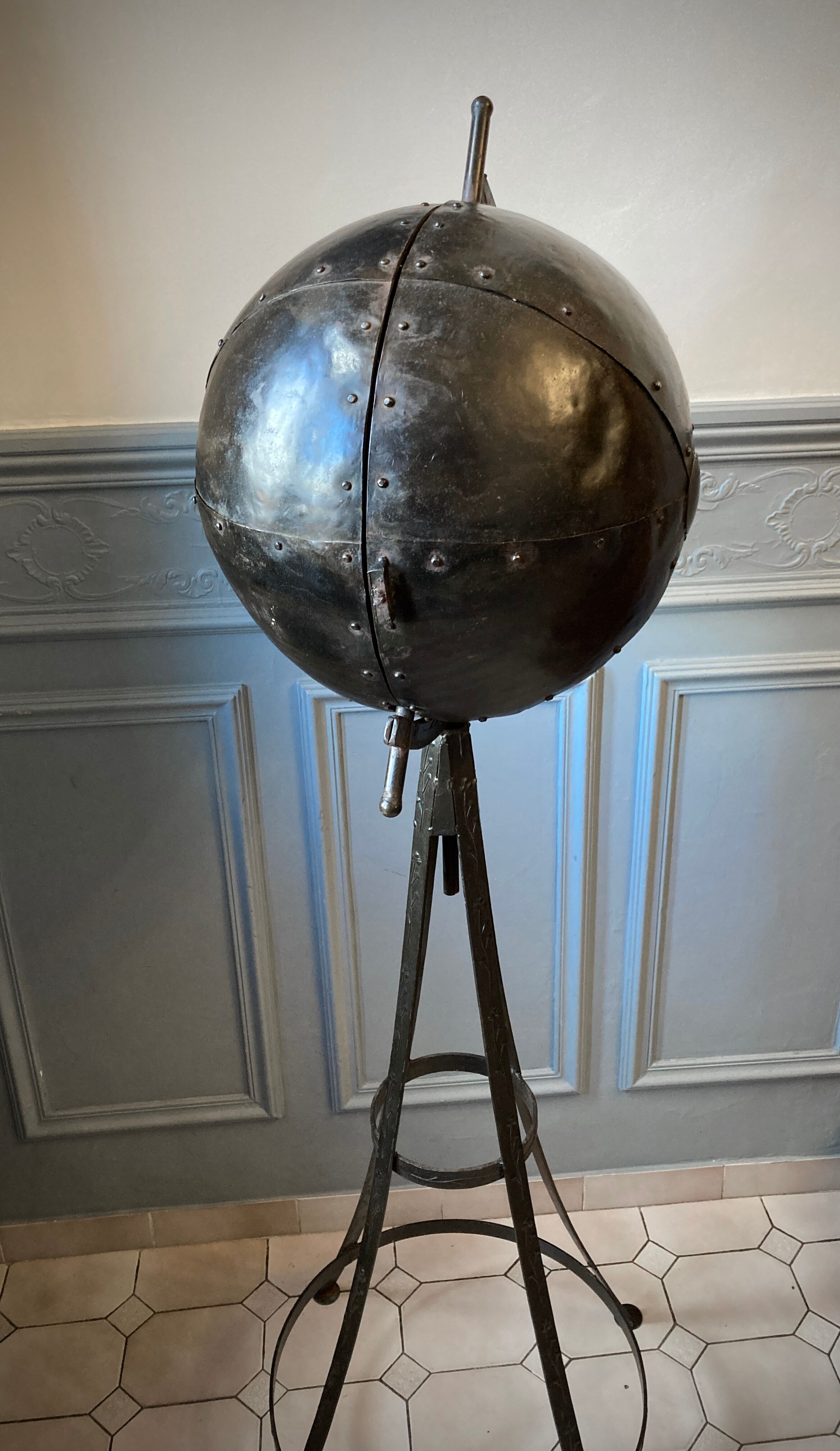 Atypical industrial furniture riveted sphere