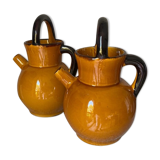 Enameled jugs signed Gomares