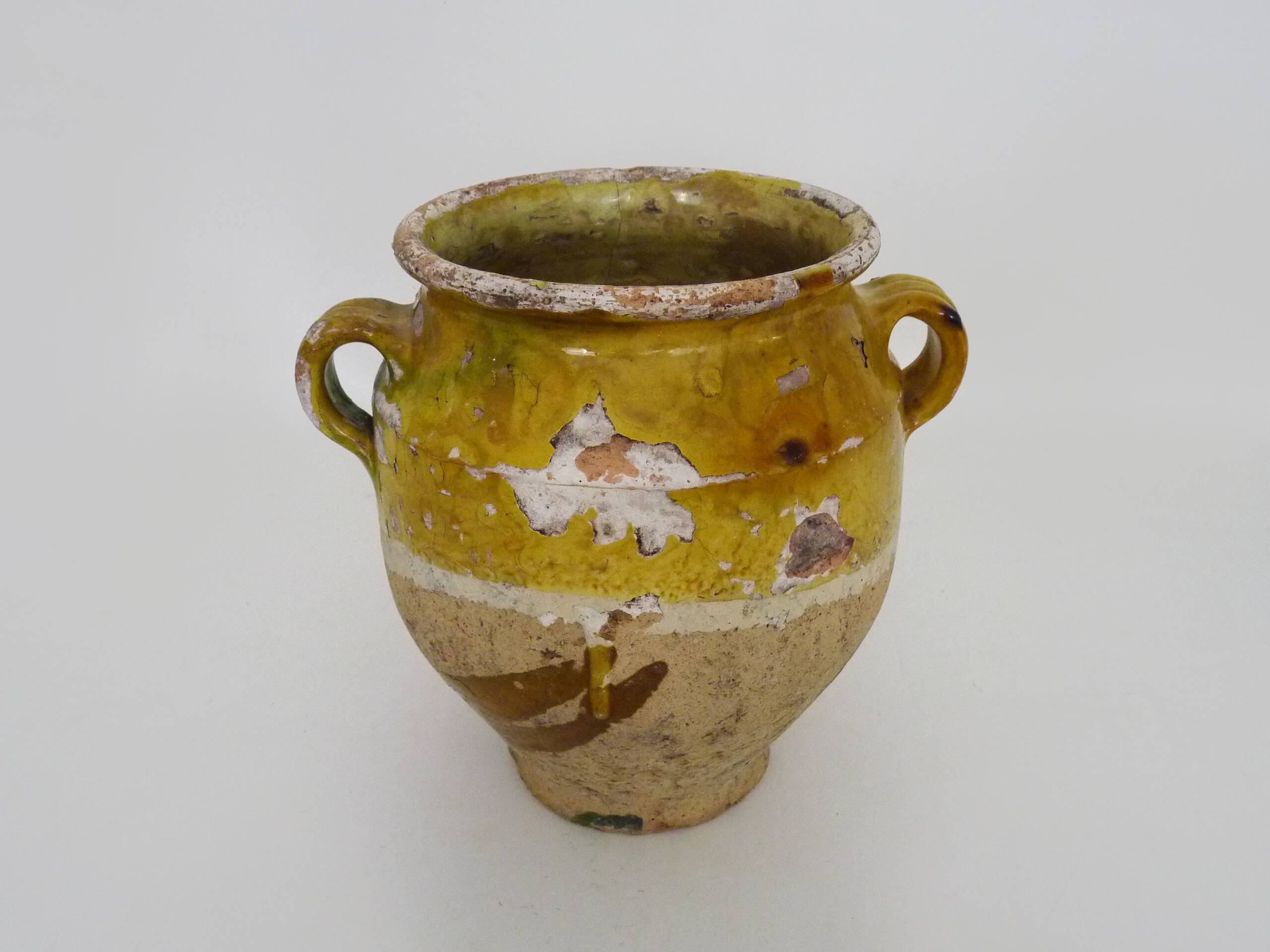 Magnificent glazed yellow confit pot, south-west of France. 19th century.