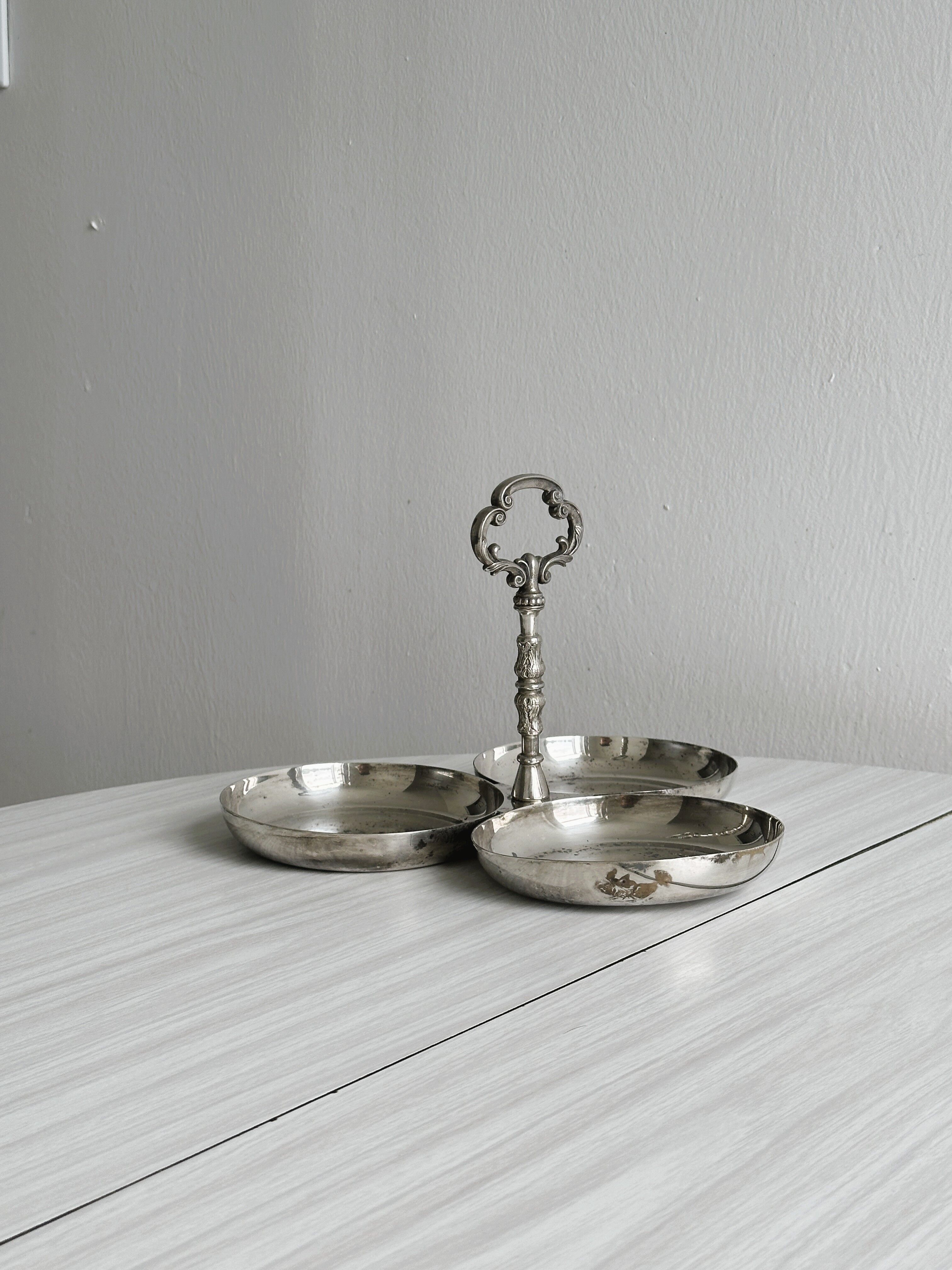 antique tripartite dish with carved handle