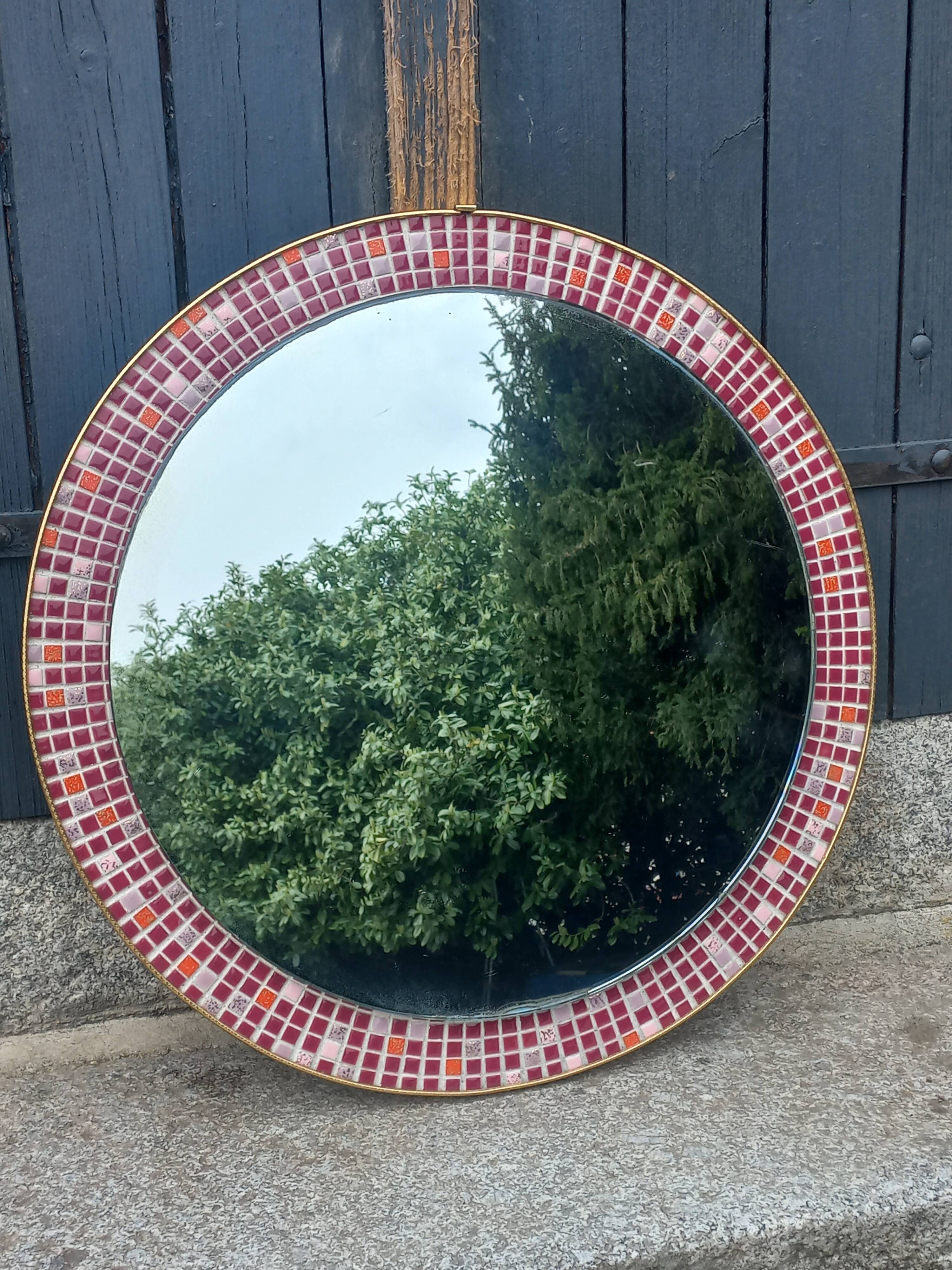 Vintage ceramic mirror from the 1960s.