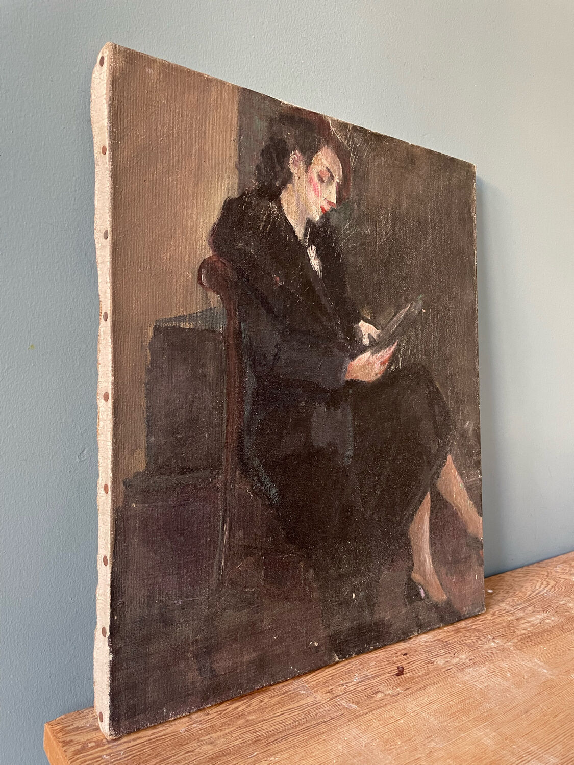 Old painting, portrait of a seated woman