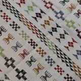 Handmade rugs in natural wool with traditional patterns