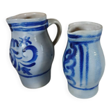 2 antique stoneware pitchers
