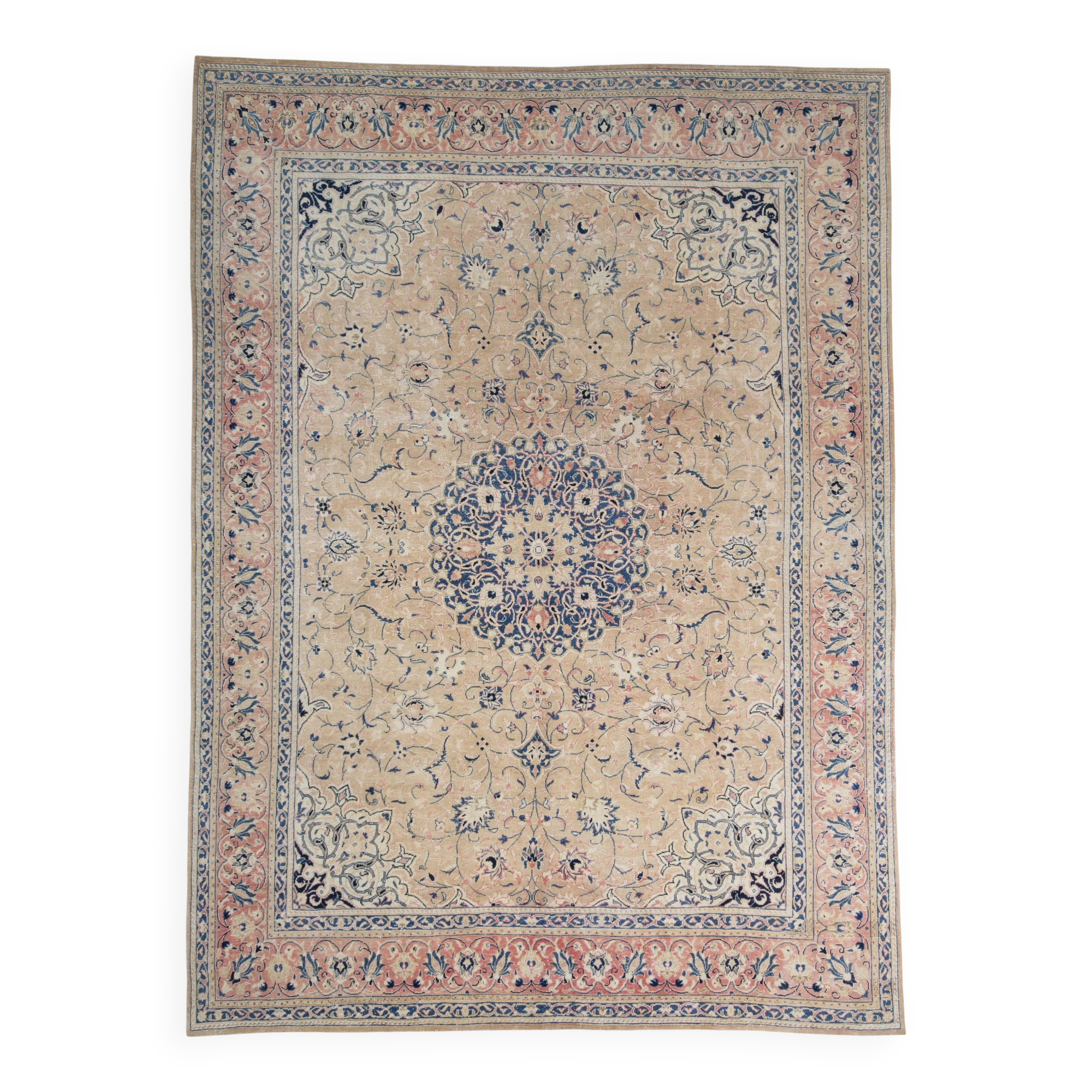 Antique Turkish wool rug in faded floral patterns, 10 x 13 feet.