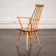 Set of 2 Windsor chairs with armrests.