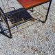Coffee table from the 60s in black and gold metal tubes mahogany formica top