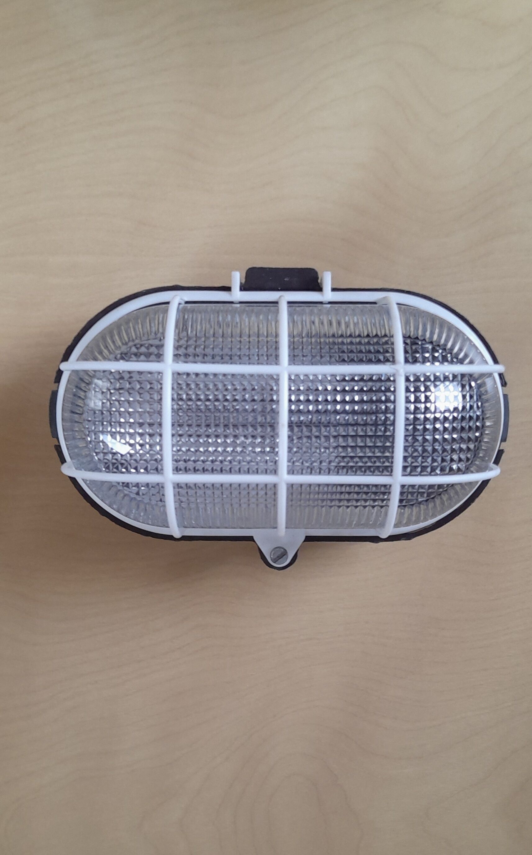 Ebonoid porthole lamp