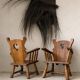 Pair of rustic oak armchairs – carved heart backrests