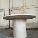 Round bass table in travertine