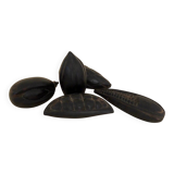 Set of decorative fruits in carved blackened wood.