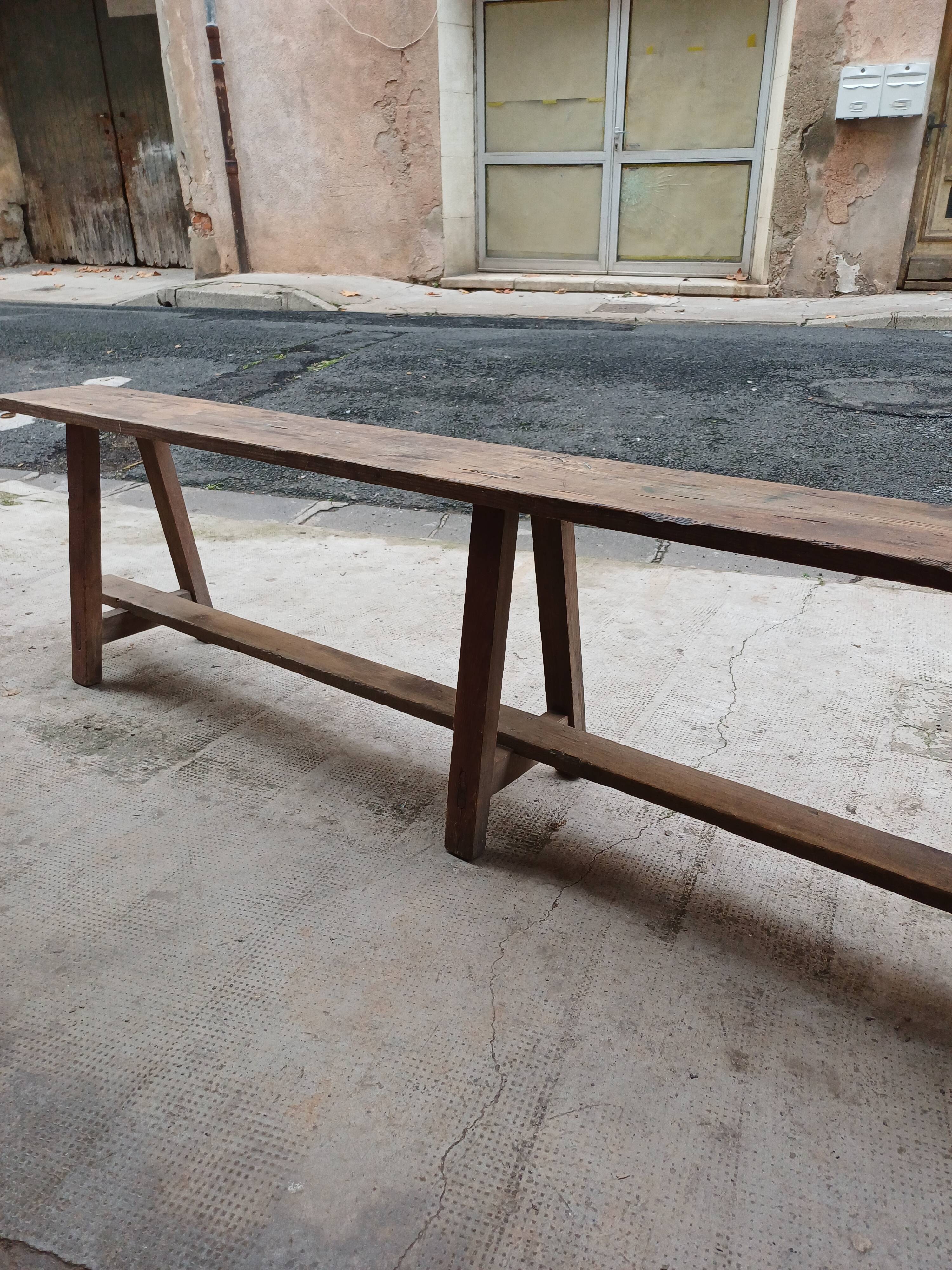 Antique wooden bench from a Catholic school, circa 1900. Beautifully crafted.