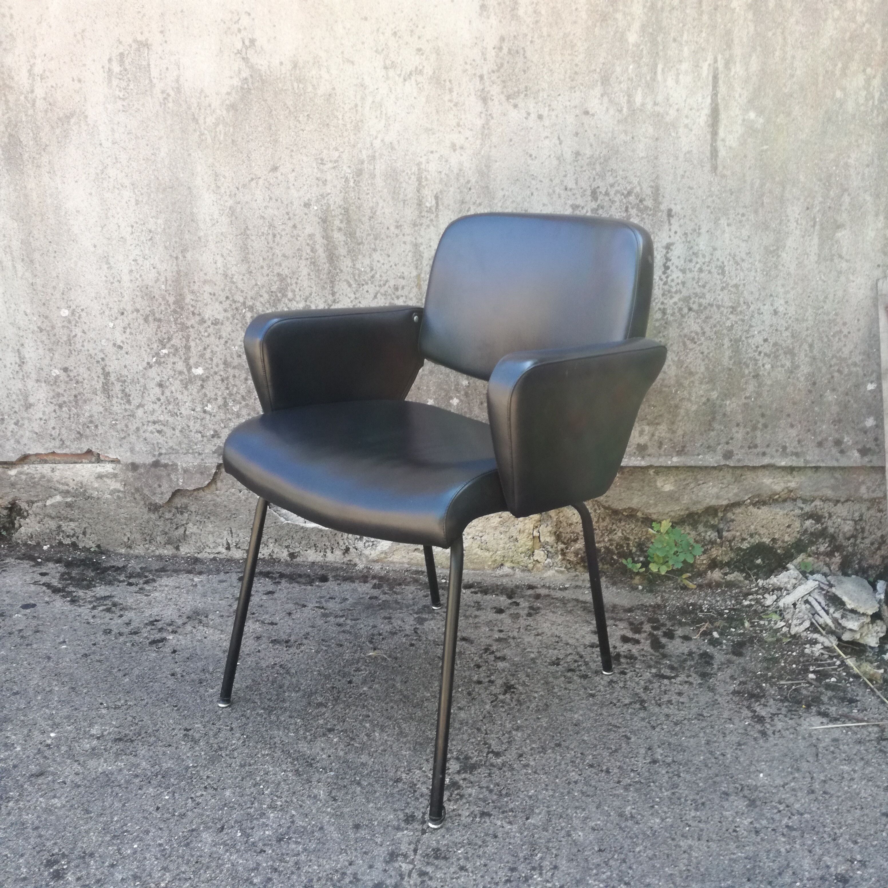 Black office chair in imitation leather