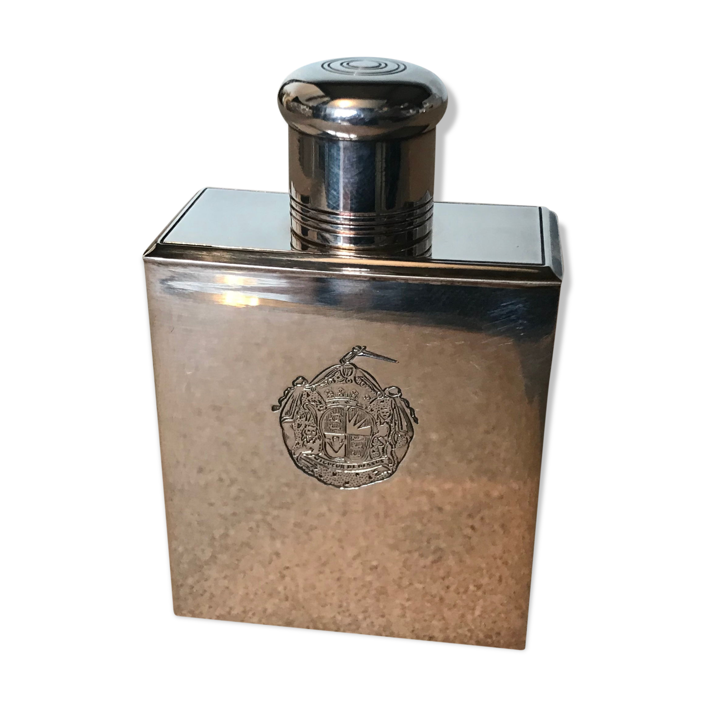 Silver metal perfume bottle