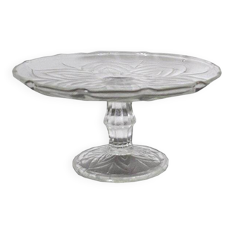 Antique glass cake stand, with raised floral pattern and faceted base (late 19th century)