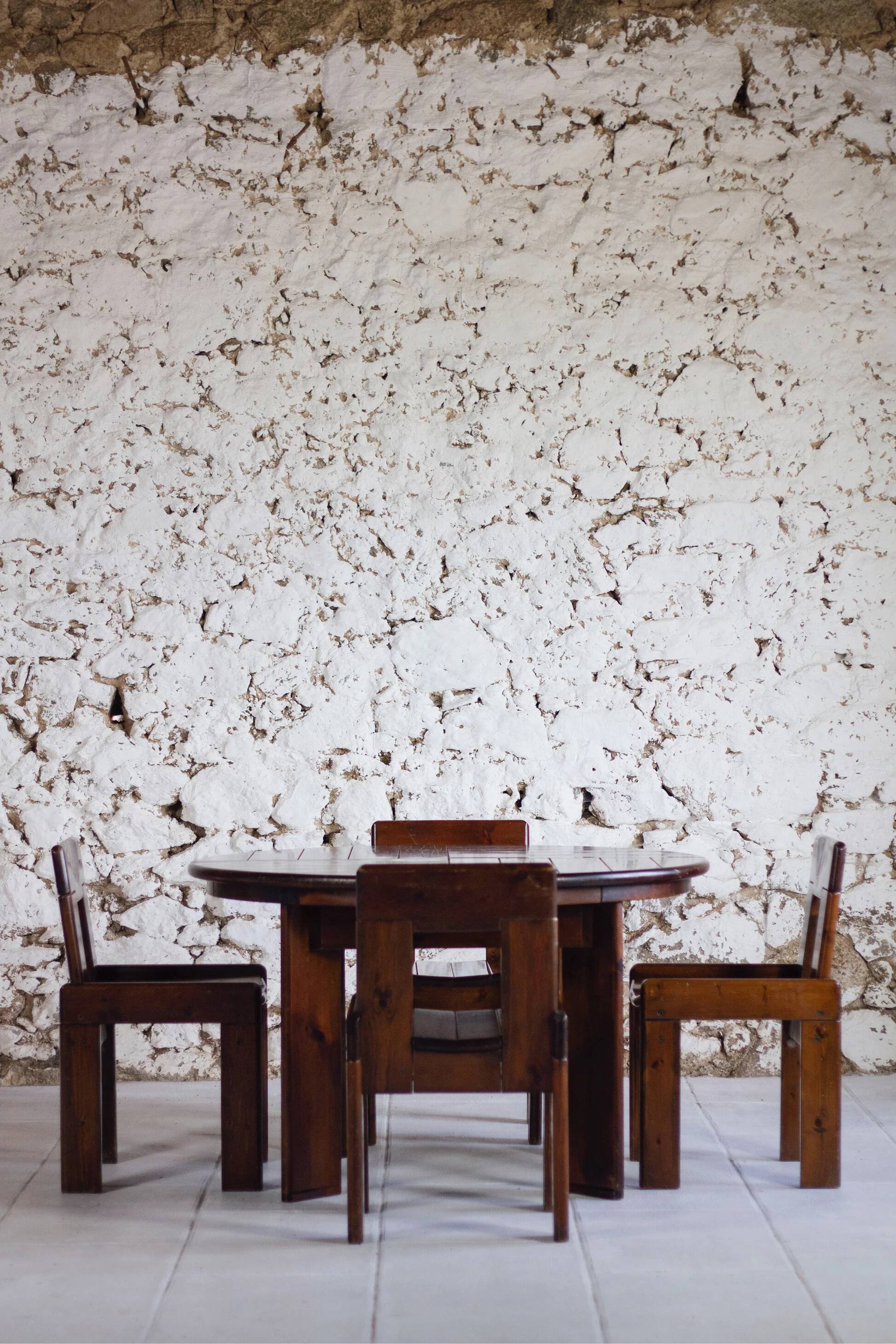 Extendable table and 5 chairs by Silvio Coppola, 1970.