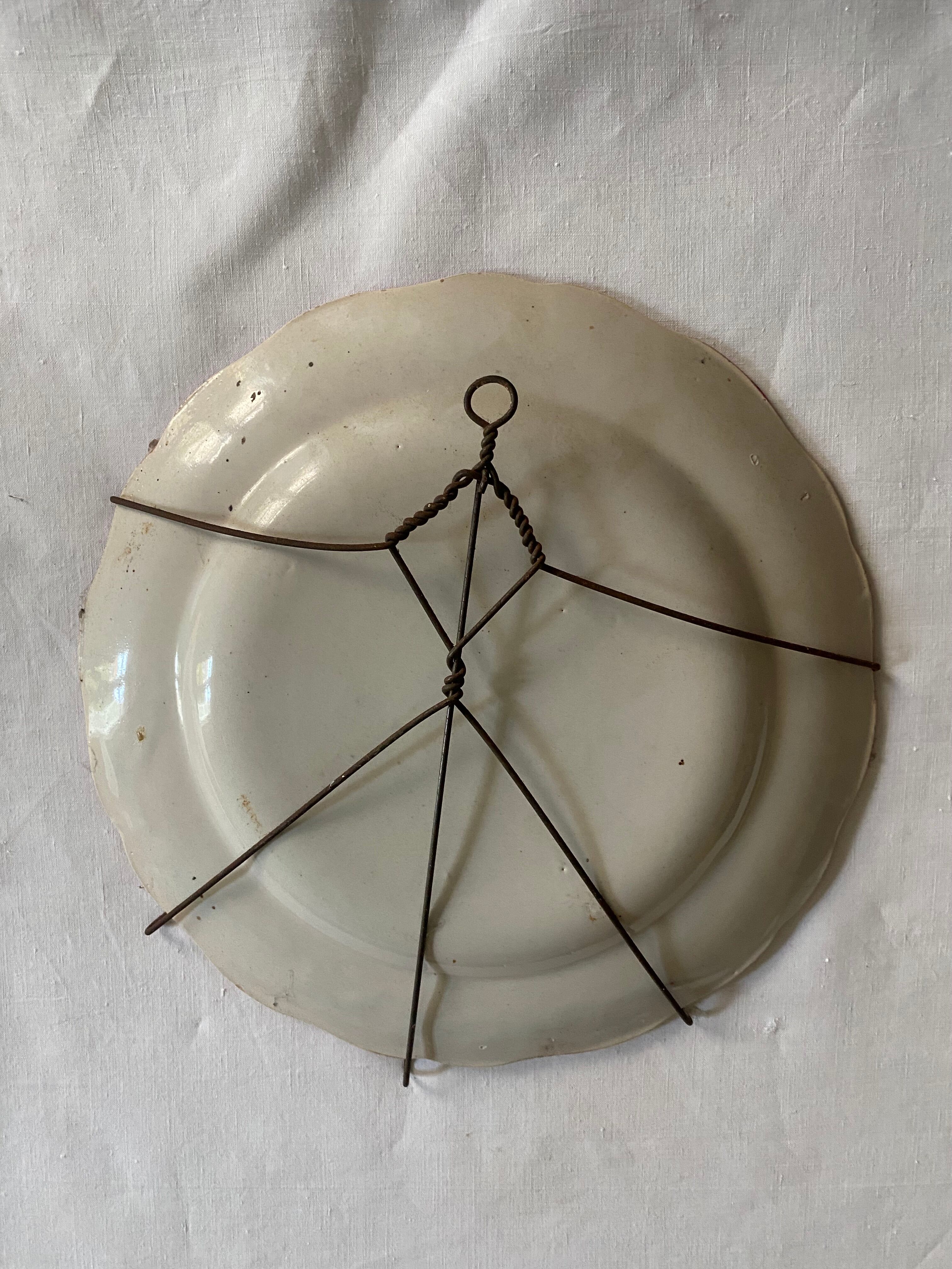 Plate of Nevers in earthenware late eighteenth century floral decoration