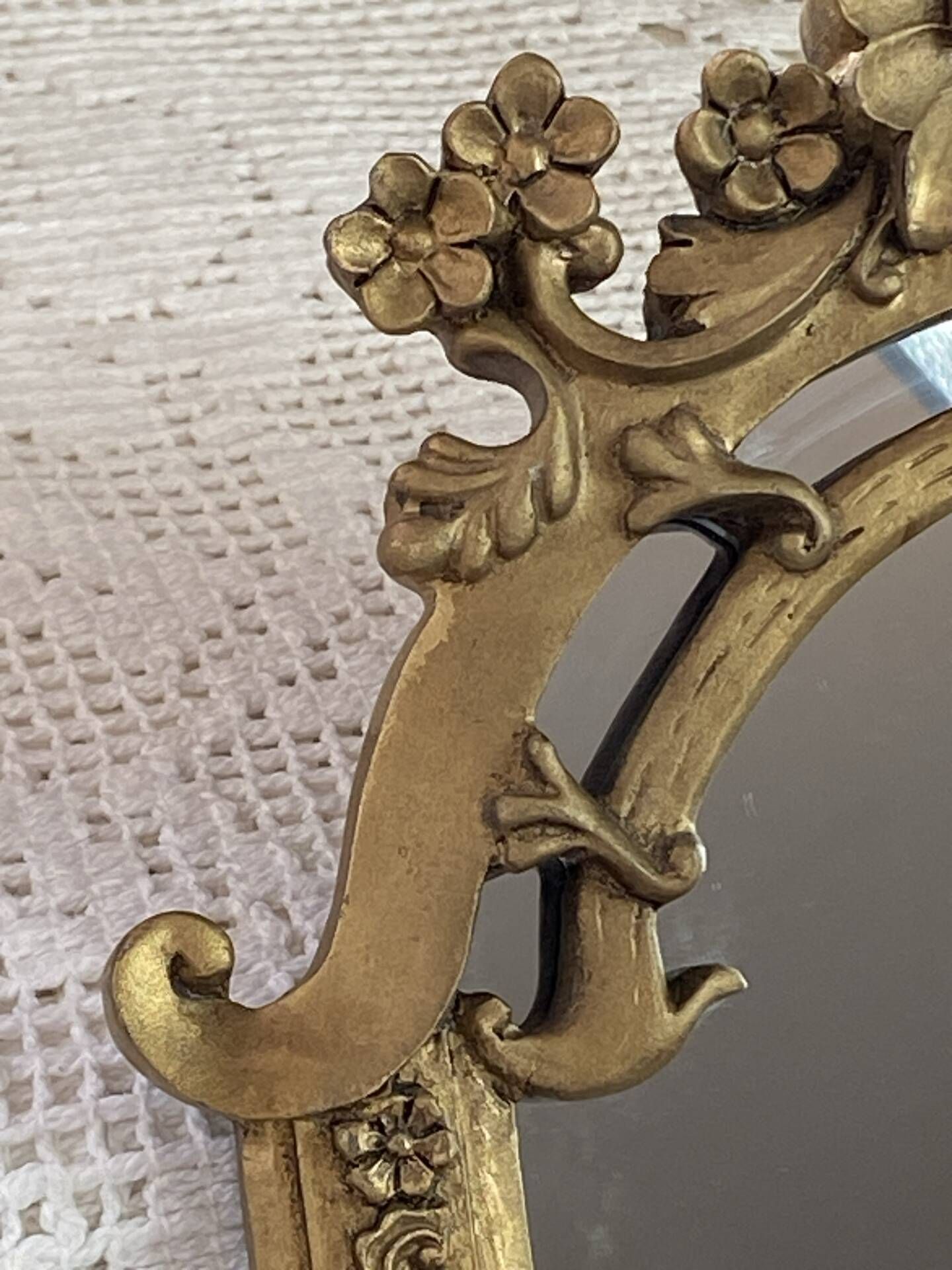 Baroque style mirror, decorated with shells and flowers.
