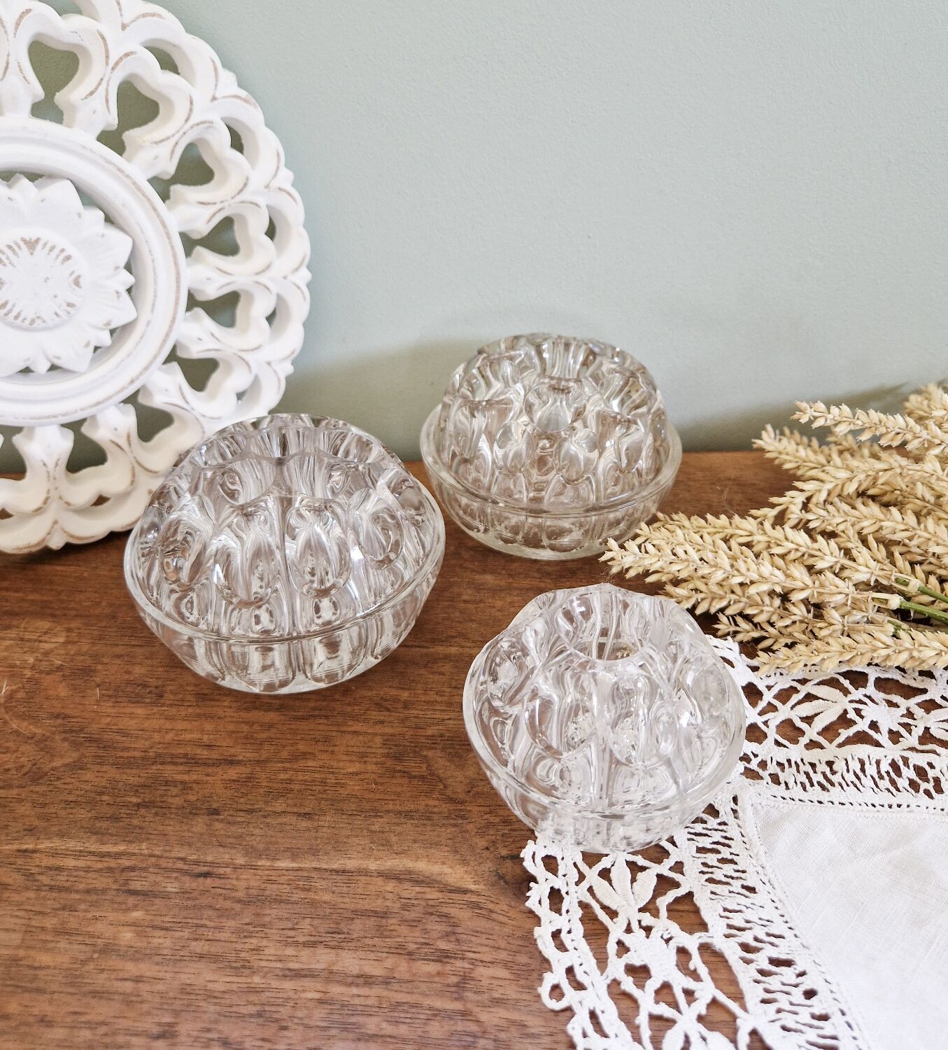 Set of three vintage flowers in transparent molded glass