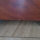 Empire/Restoration style console table with scrolled ends, mirrored back, and claw feet.