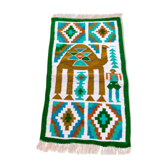 Green kilim carpet