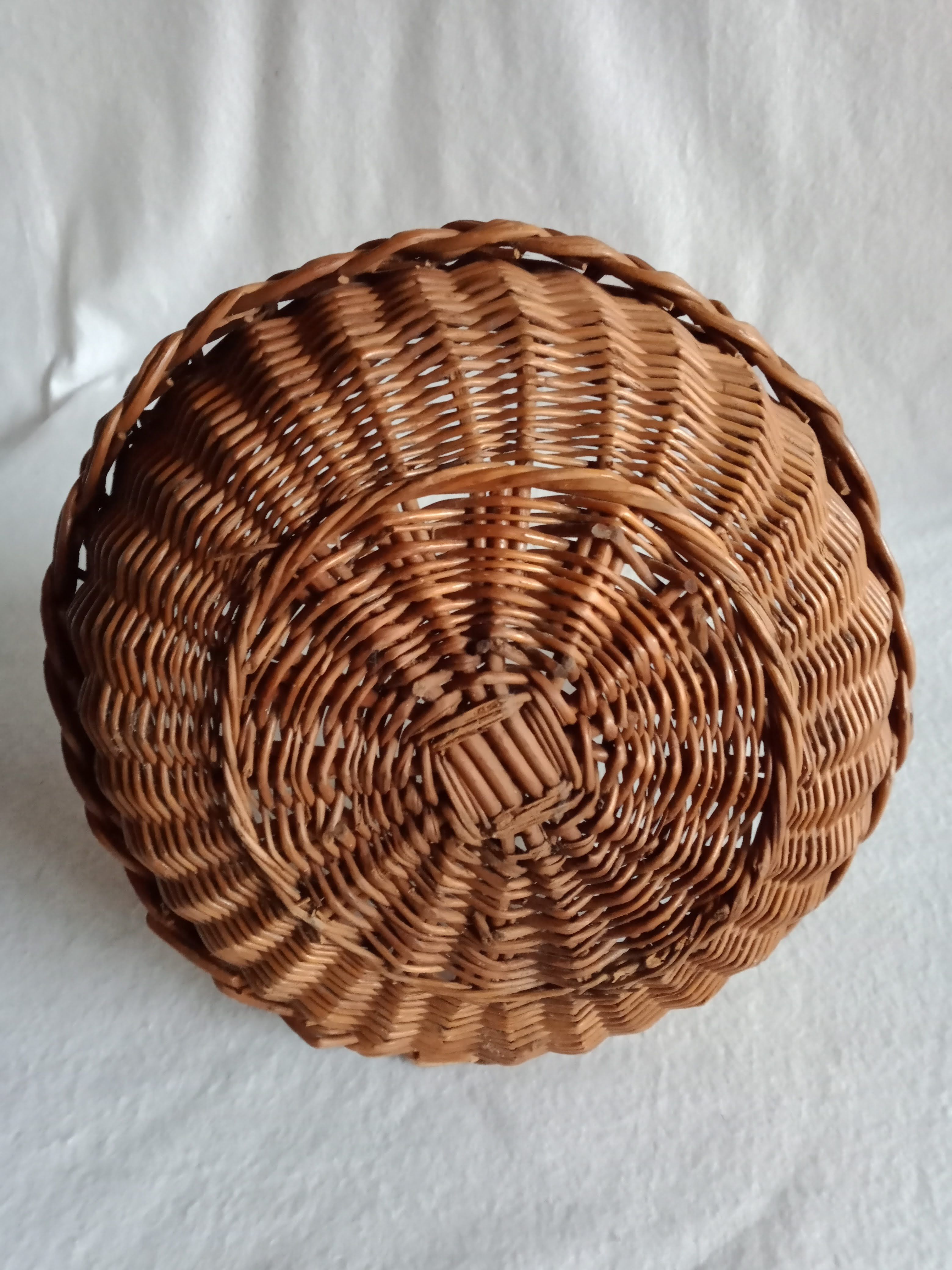 Old basket in braided wicker