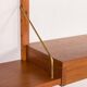 Danish teak wall unit in the style of Cadovius, Sorensen with a lamp, 1970s