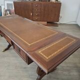 English desk in solid mahogany with lion paws. Leather top