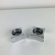 Pair of egg cups or space age napkin rings in aluminium, 1970s.
