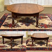 Oval coffee table in fir from the early 20th century.