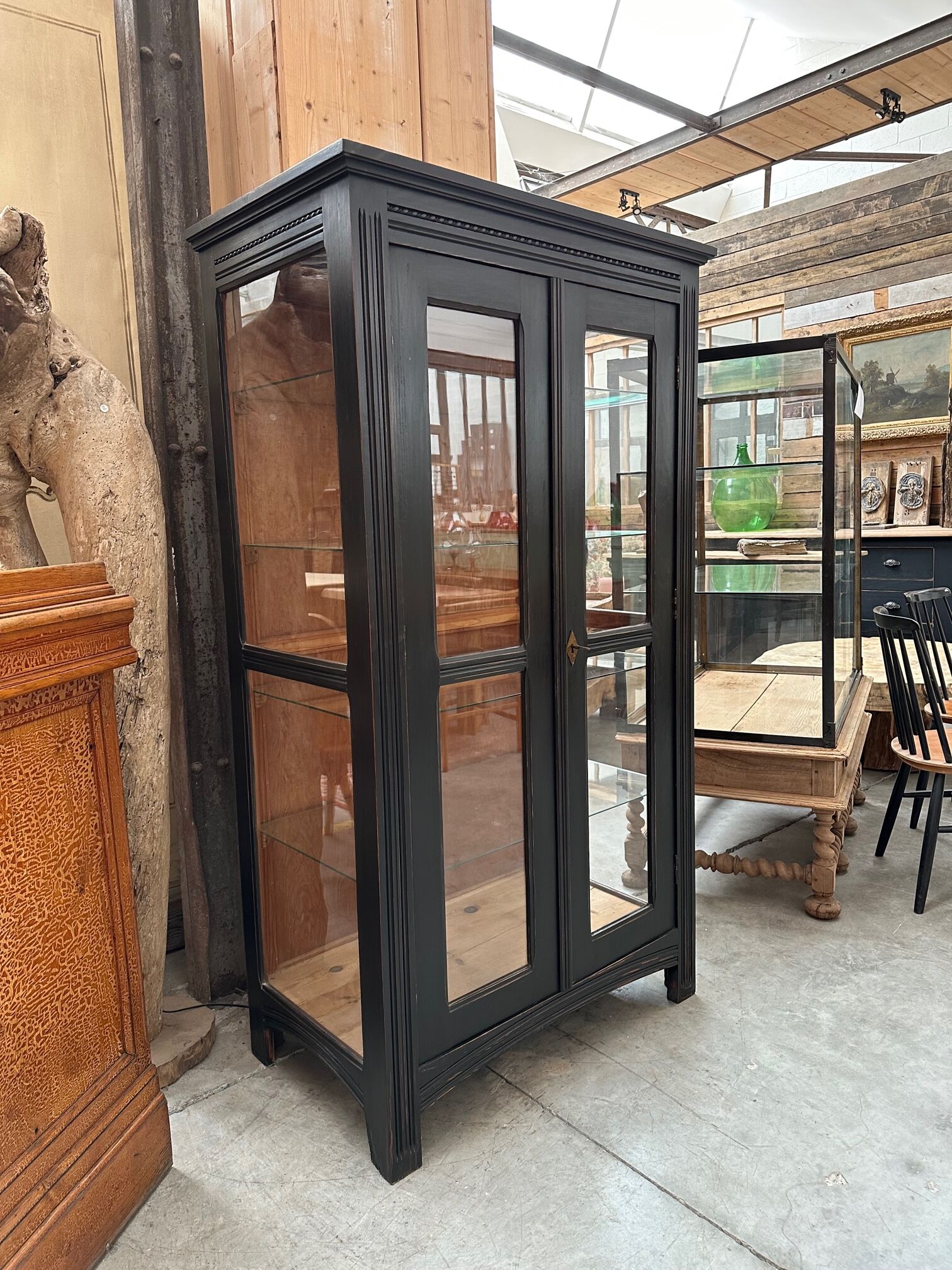 Patinated showcase early twentieth century