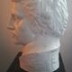 Patinated plaster man head.