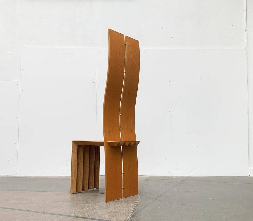 Postmodern chair with a high backrest