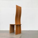 Postmodern chair with a high backrest