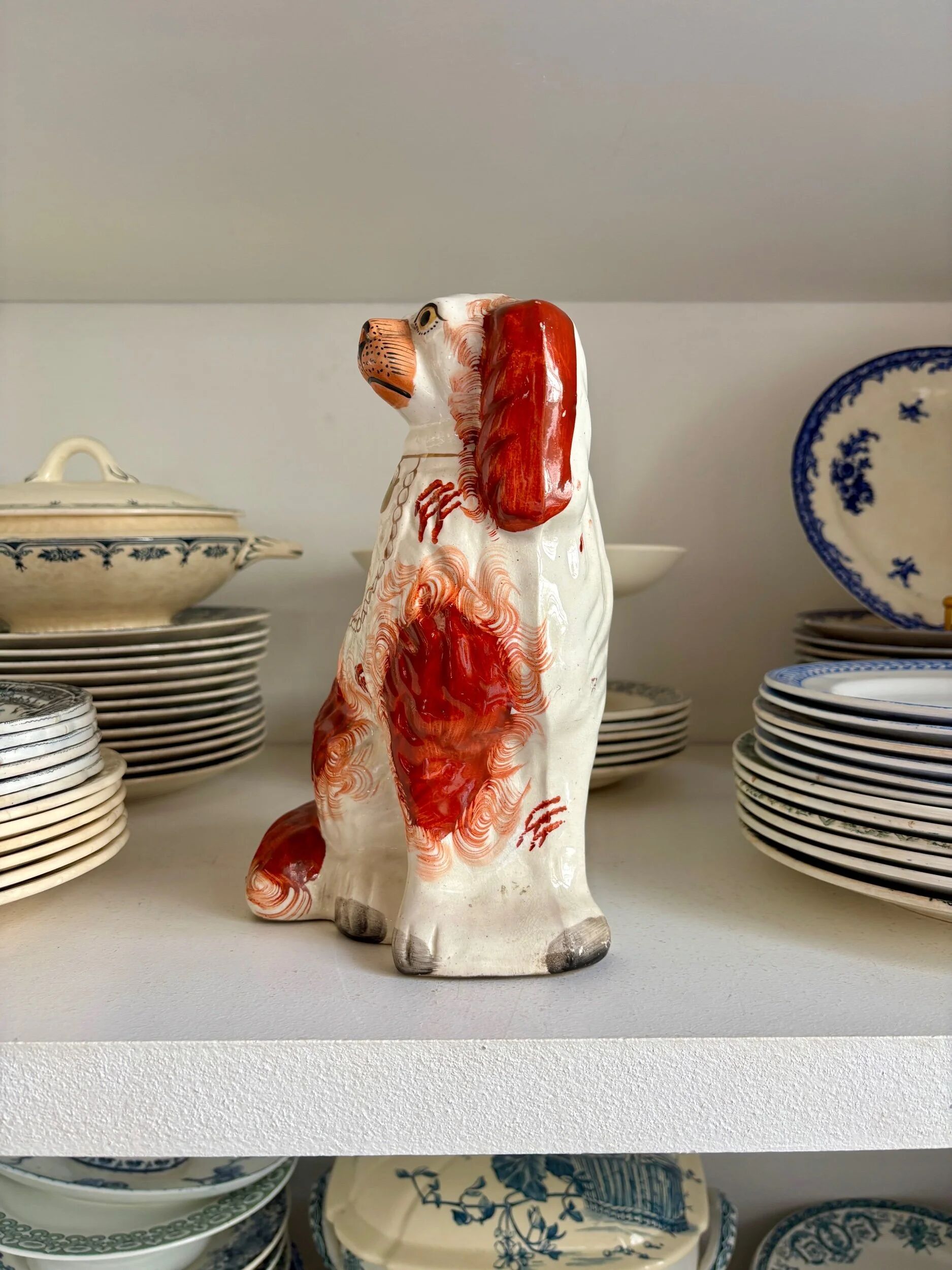 Staffordshire porcelain King Charles Cavalier dog in red, number 2, 19th century.