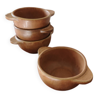 Four vintage bowls with earth-colored handles