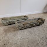 Old planters in faux cement wood