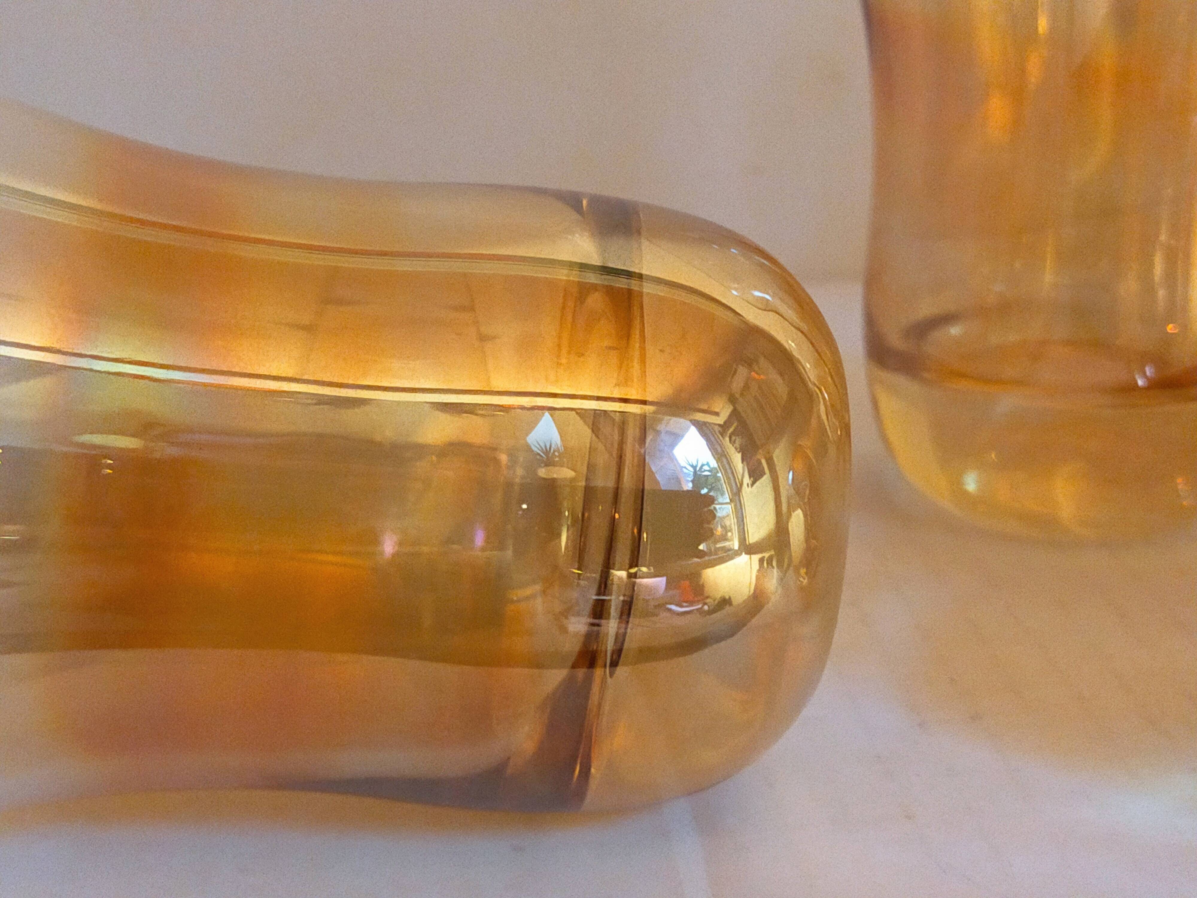 Four iridescent honey blown glass glasses