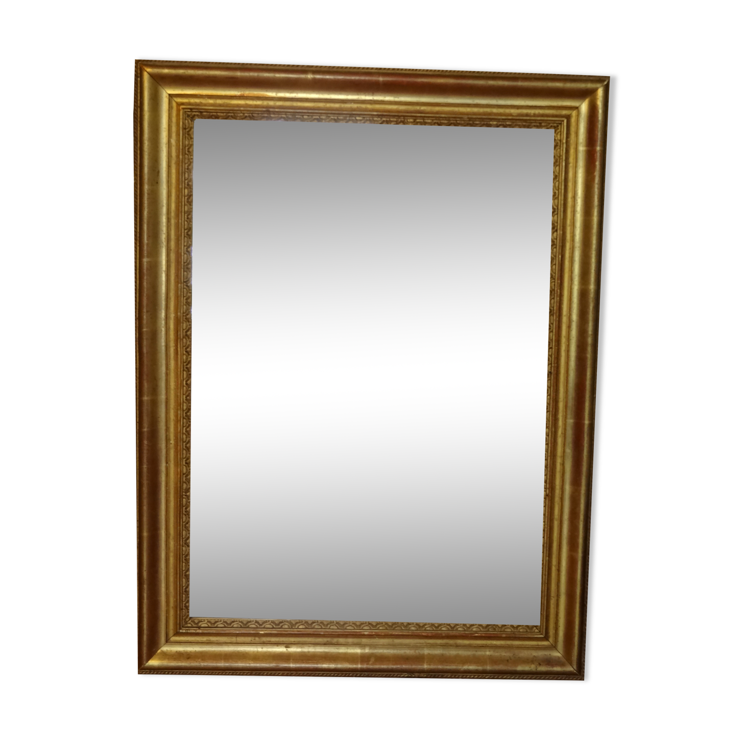 Empire period mirror, early nineteenth in gilded stucco wood H 72 cm